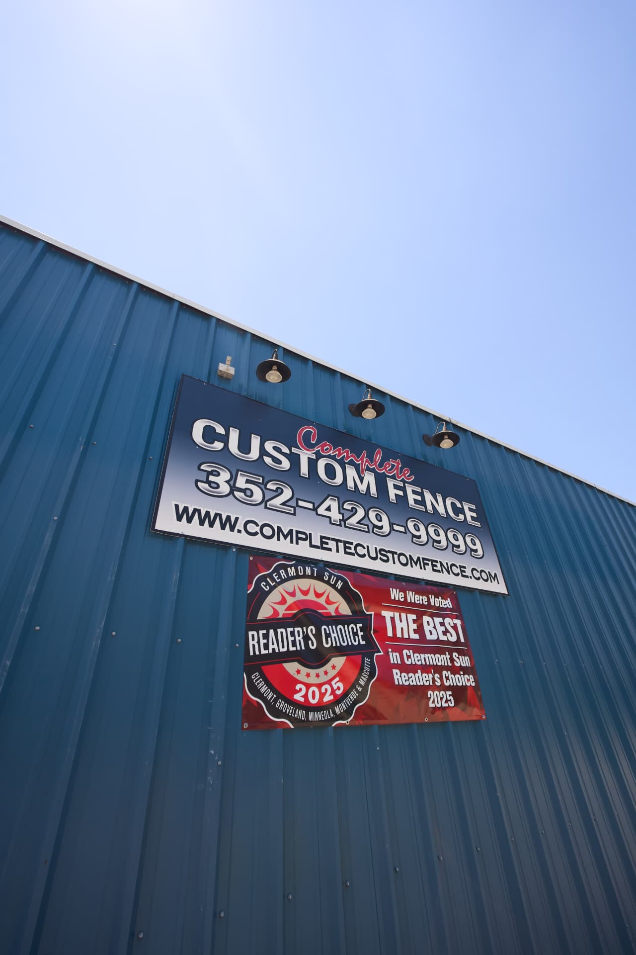 Complete Custom Fence shop sign and 2025 Reader's Choice award banner